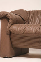 Side profile view showing the sofa's deep cushioning and stance