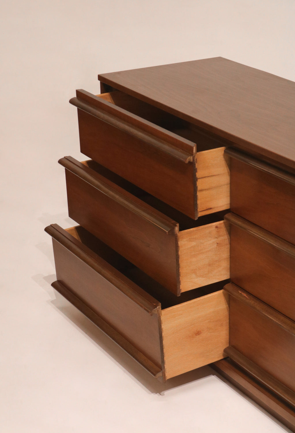 Side view of open drawers showing sturdy dovetail joinery and construction
