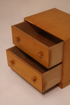 Side view of open drawers showing plywood sides and depth