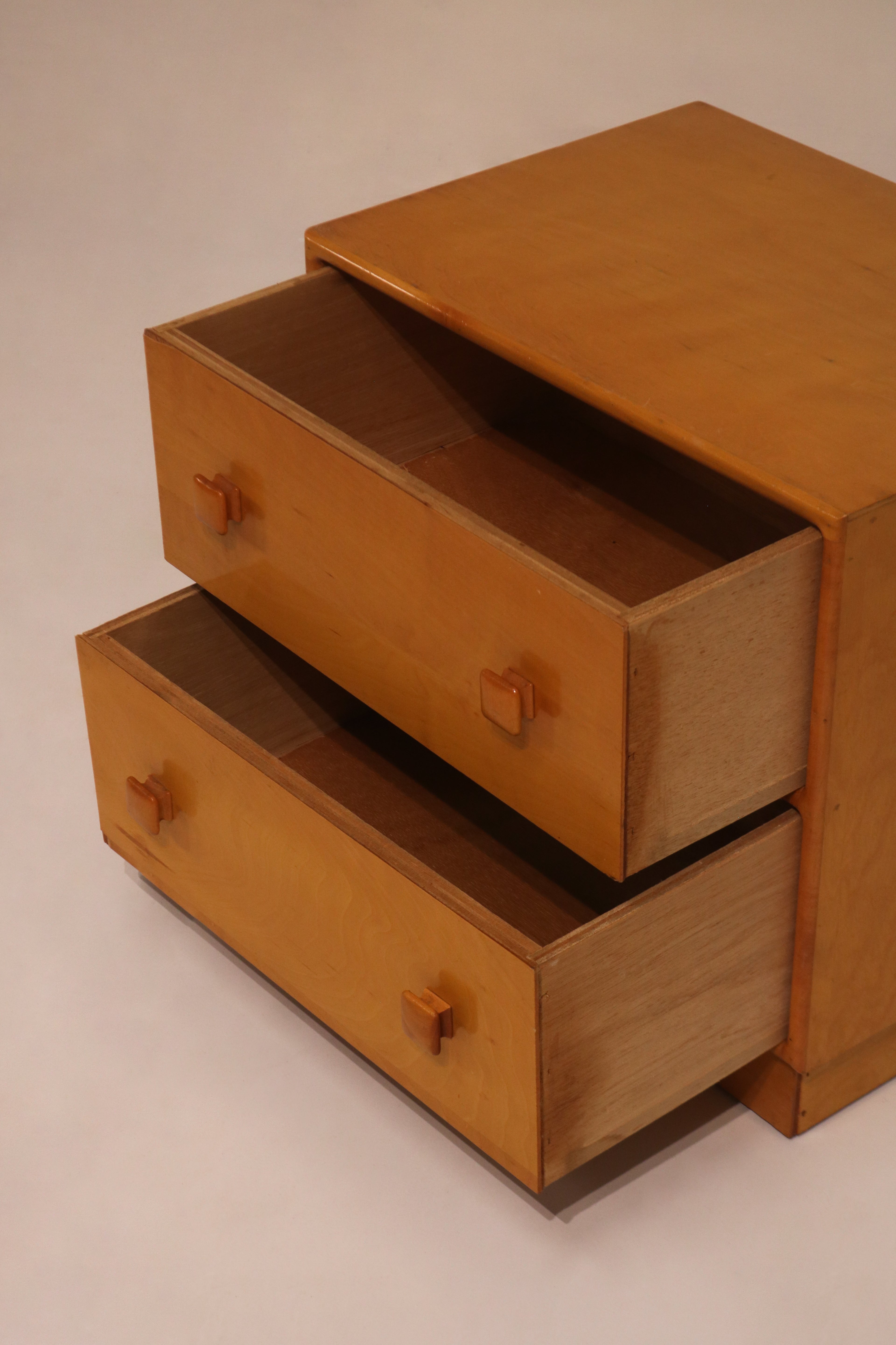 Side view of open drawers showing plywood sides and depth
