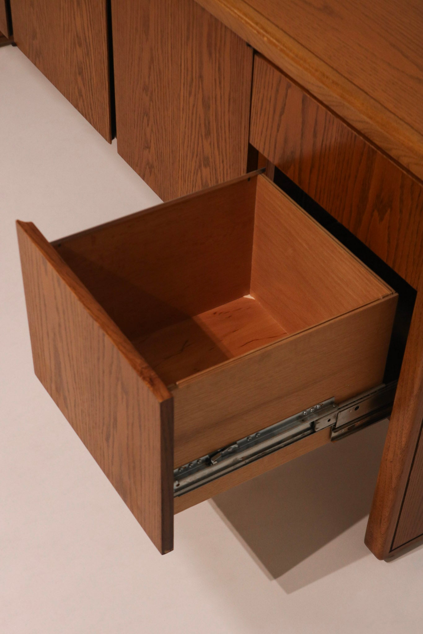 View of a single drawer open demonstrating the slide mechanism