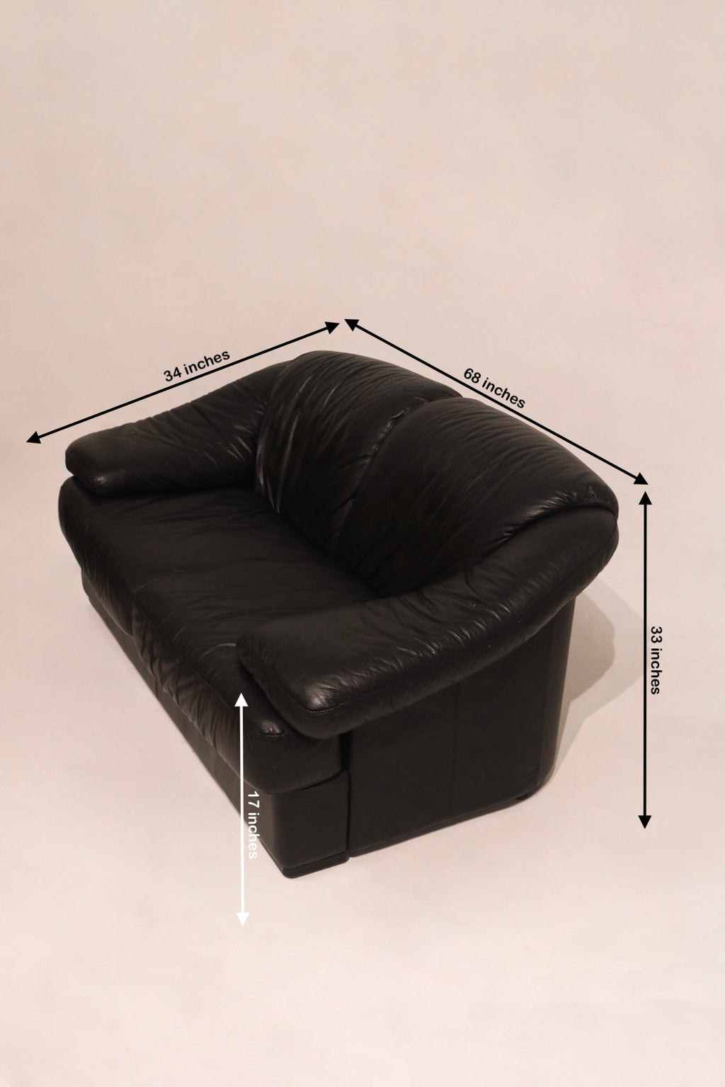 Dimensions diagram 68 by 34 by 33 inches seat height 17 inches leather loveseat