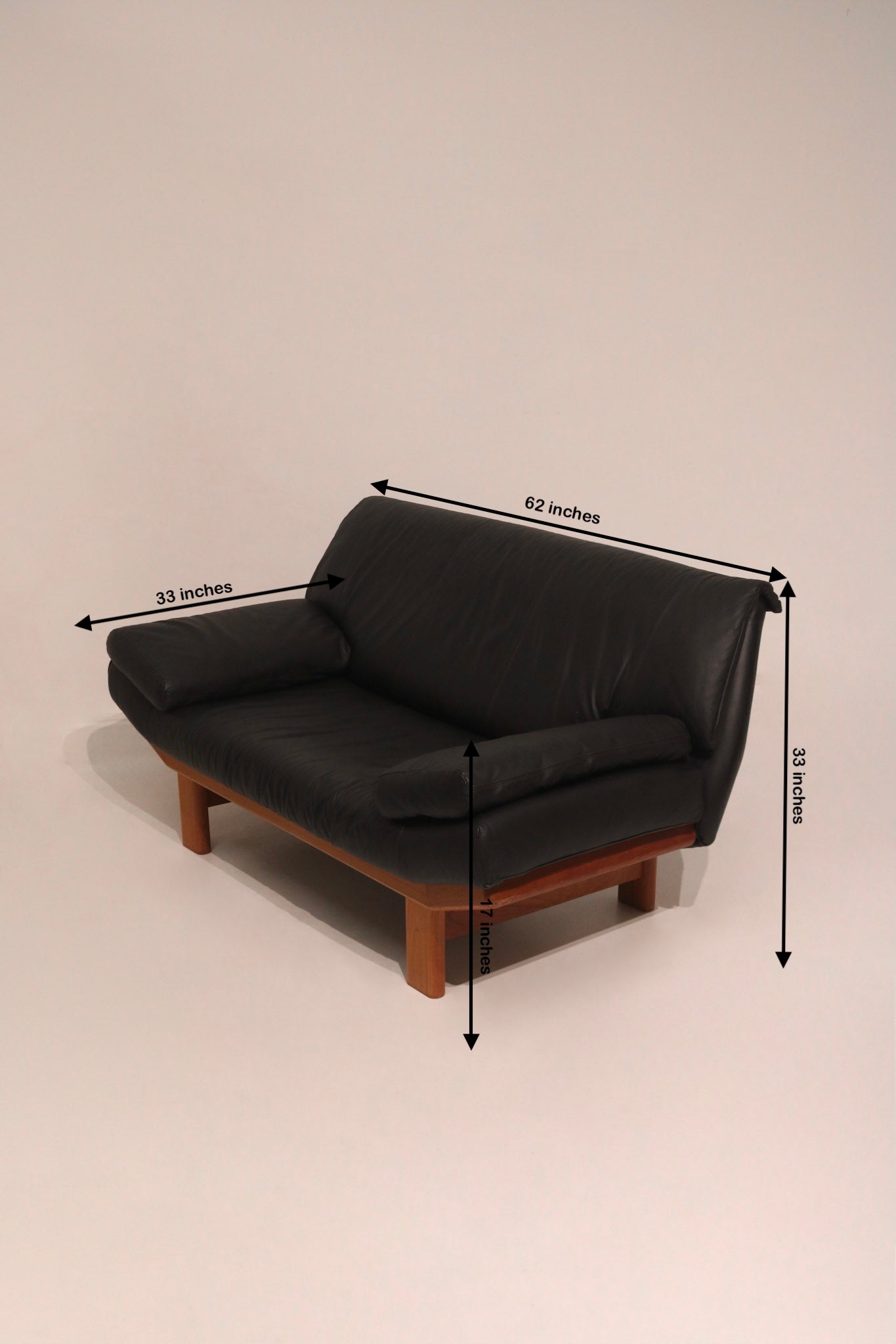 Dimensions diagram 62 by 33 by 33 inches seat height 17 inches Danish sofa