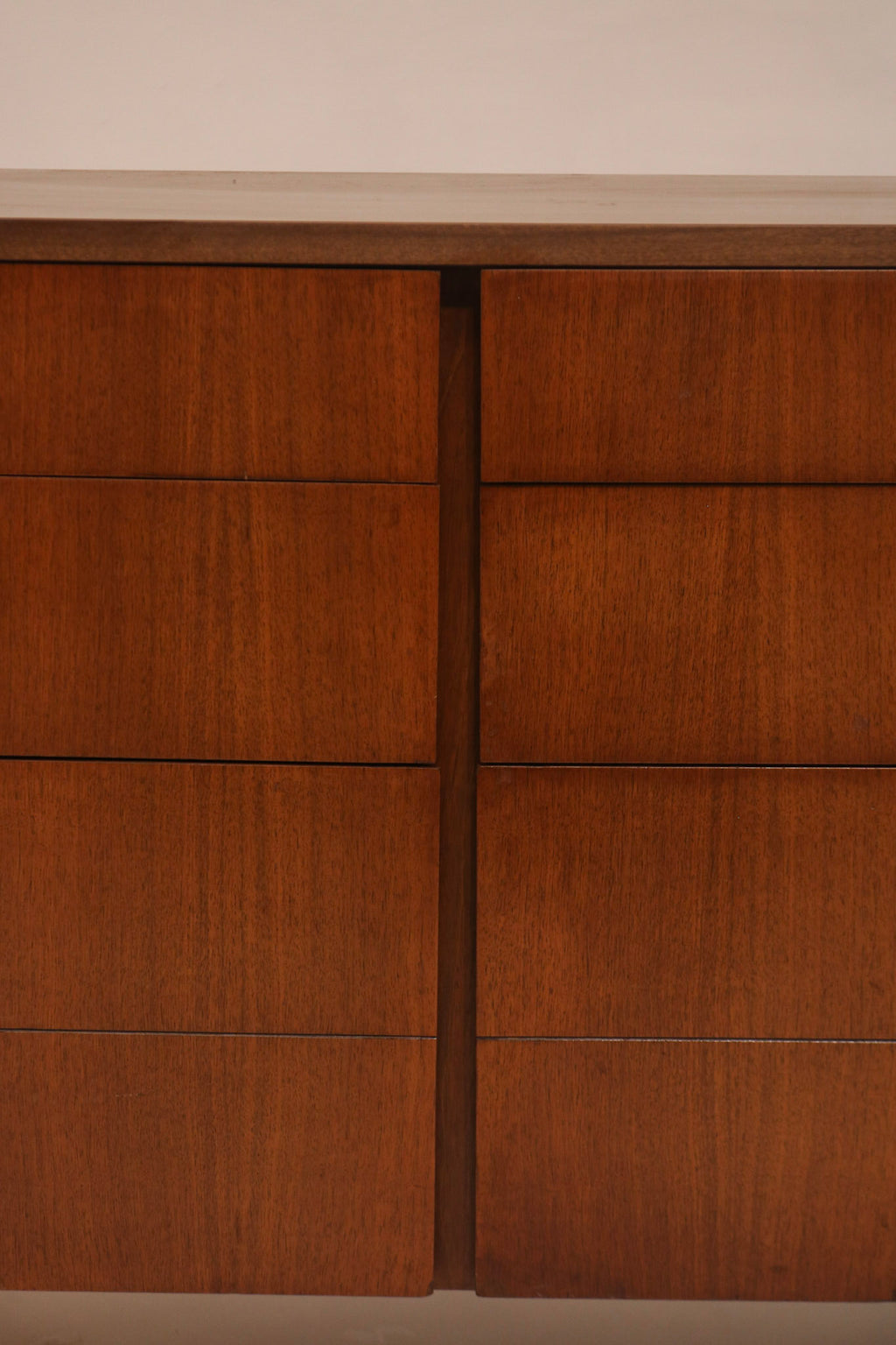 Close-up of sliding door panels showcasing walnut wood grain texture