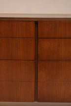 Close-up of sliding door panels showcasing walnut wood grain texture