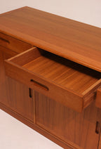 Detail of sliding doors showing matched teak veneer grain pattern