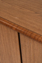 Close-up of solid oak corner joint showing wood finish and wear
