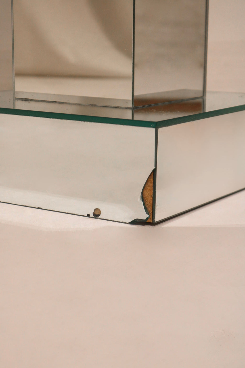 Back view postmodern standing mirror showing structural support and frame design