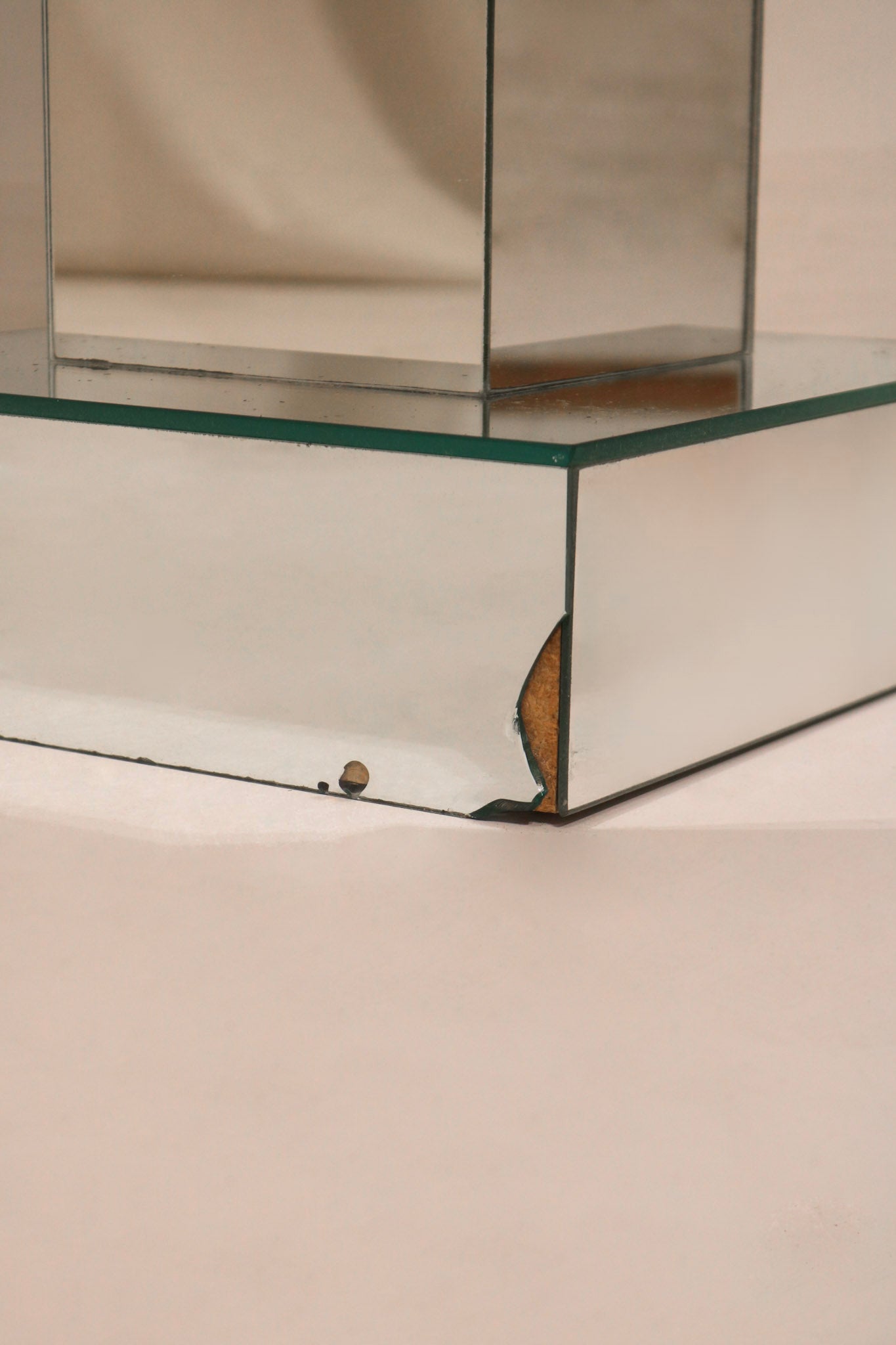 Back view postmodern standing mirror showing structural support and frame design