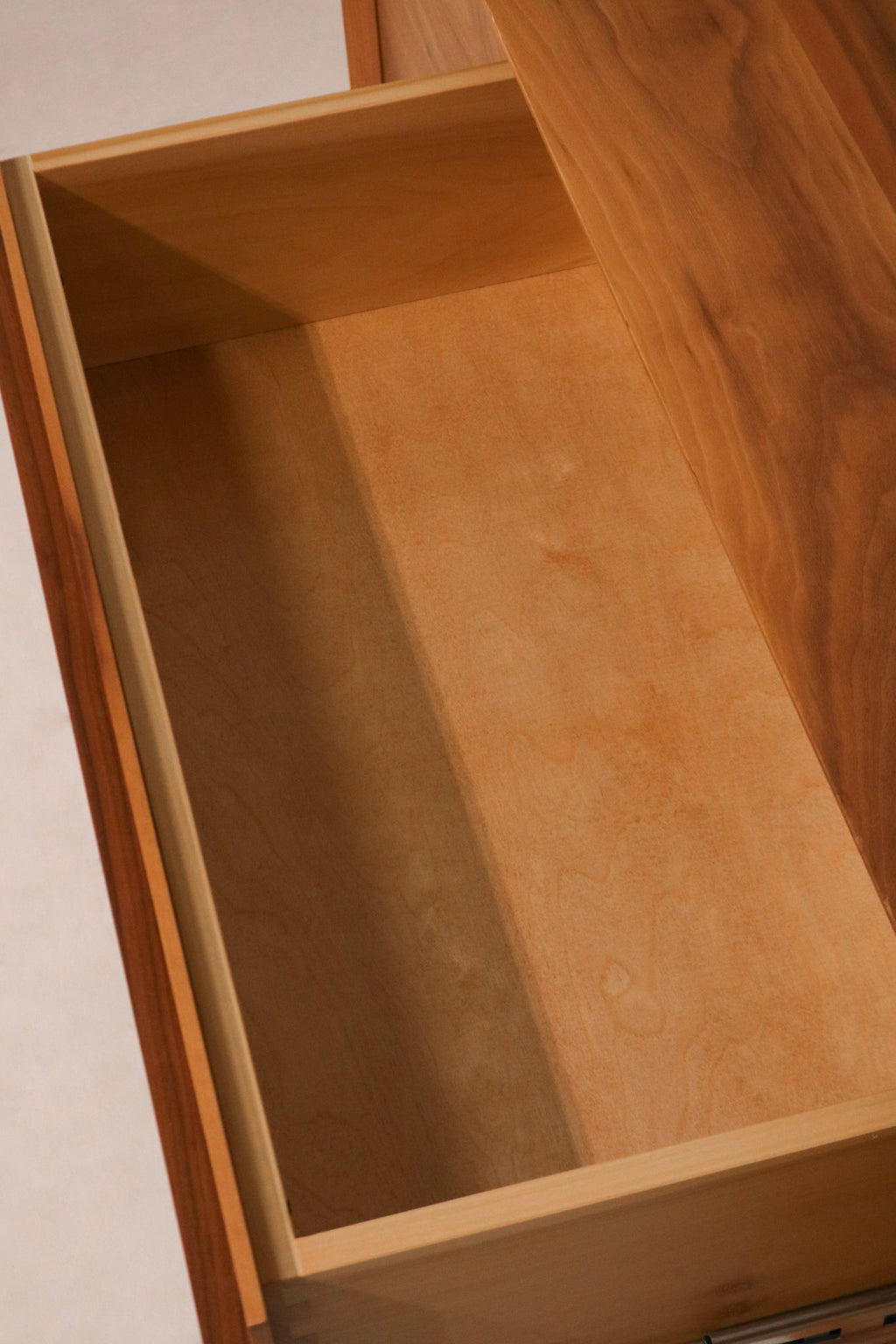 Detail of the sturdy steel base legs adding an industrial modern touch