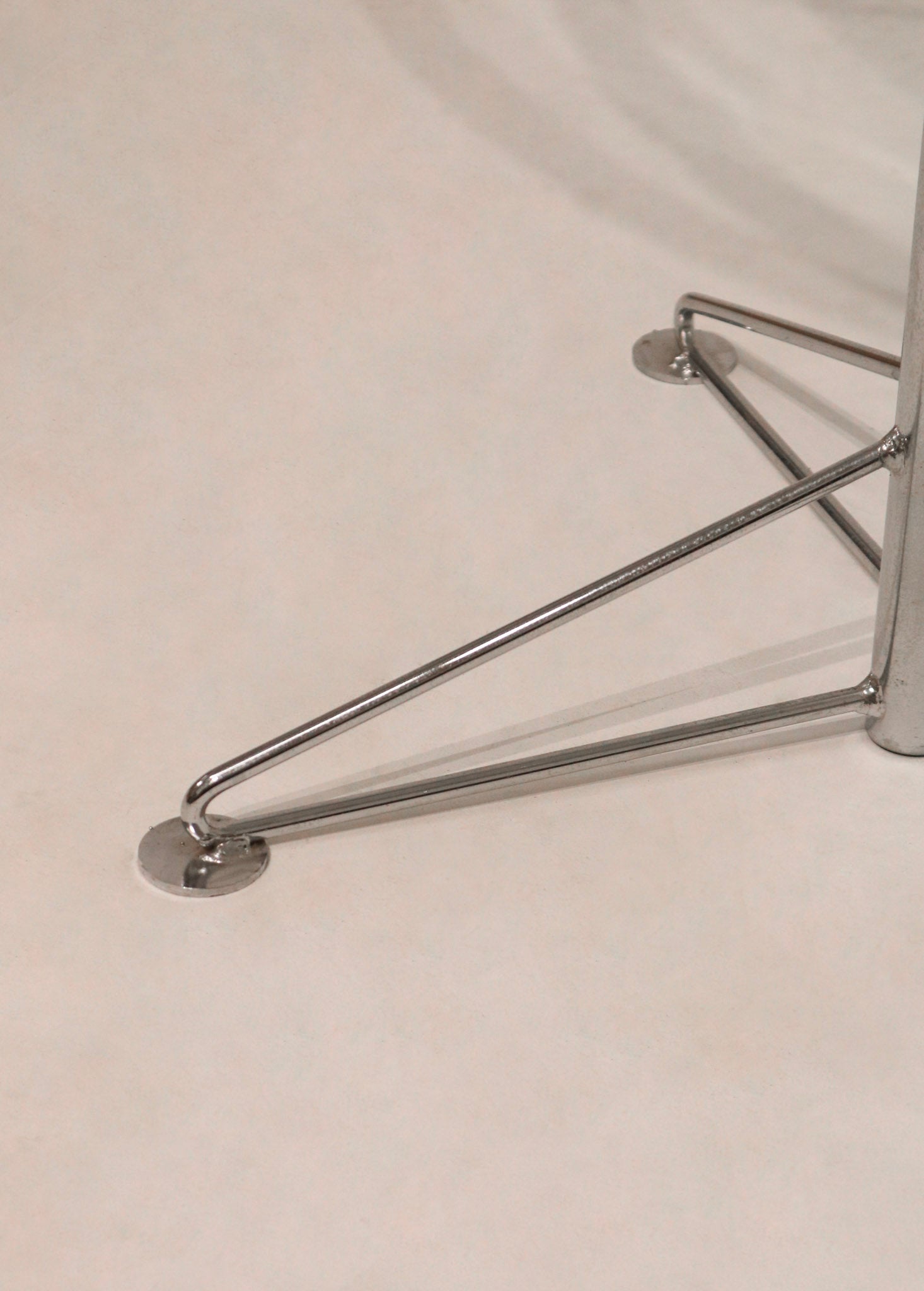 Detail of the steel leg end with floor protector cap