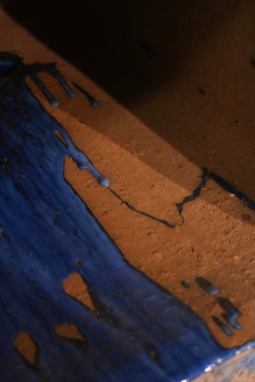 Close-up showing minor surface hairline crack typical of vintage ceramic