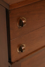 Detail view of light scratches or wear marks on the wood surface