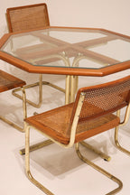 Detail of table base metal legs showing vintage condition and wear
