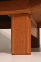 Close-up of solid teak leg base providing sturdy support
