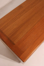 Macro shot of the rich teak wood grain texture and color depth