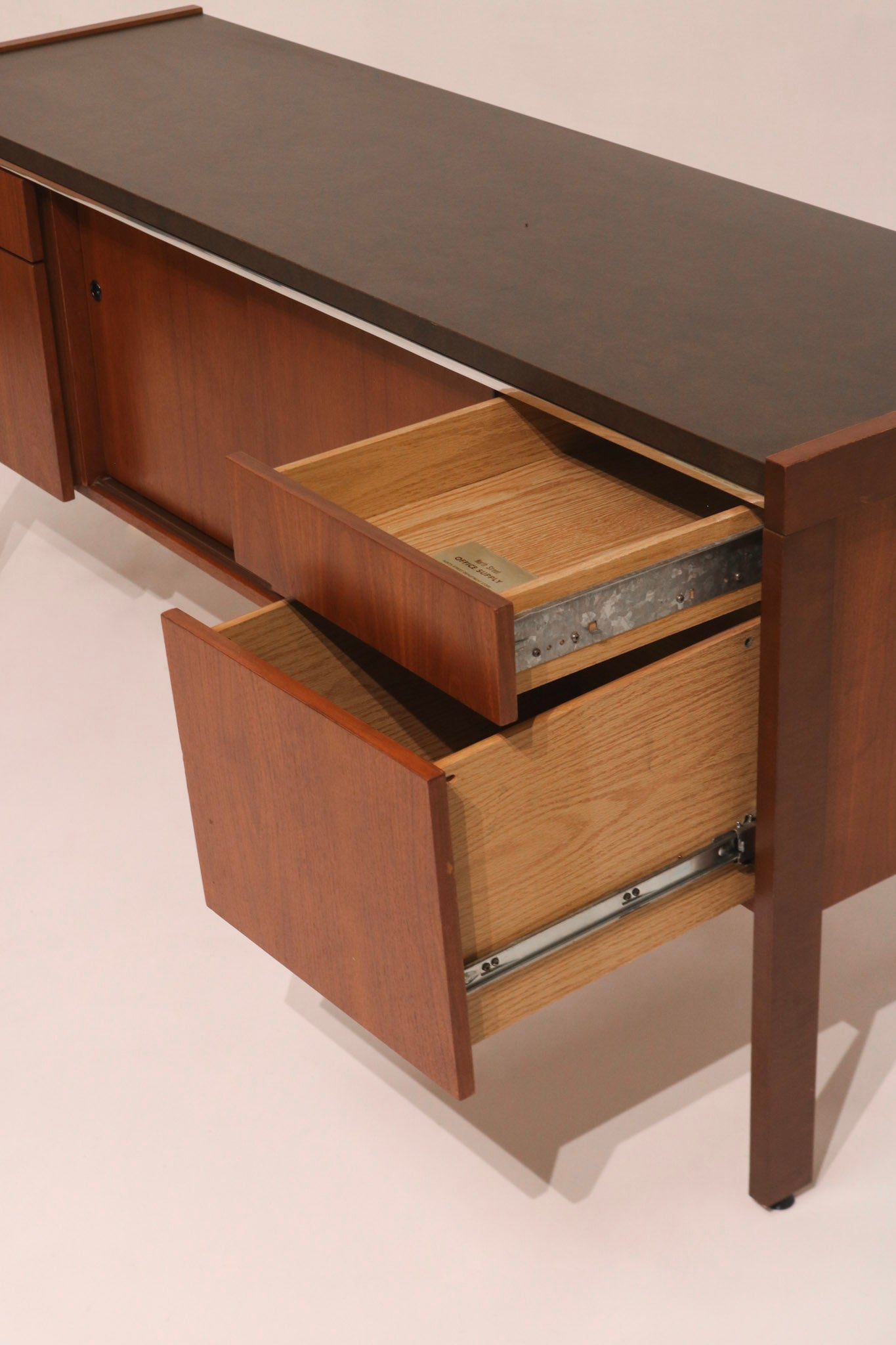 Side angle view of three drawers open demonstrating functionality