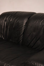 Top angled view showing thick genuine leather and comfort depth of seat