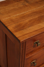 Detail of top corner joinery showing edge wear consistent with age