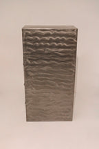 Top corner detail showing metal construction and industrial rivet style