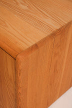 Detail of top corner finish showing solid oak construction and condition
