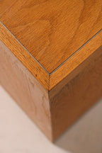 Detail of the top corner showing solid oak construction and thickness