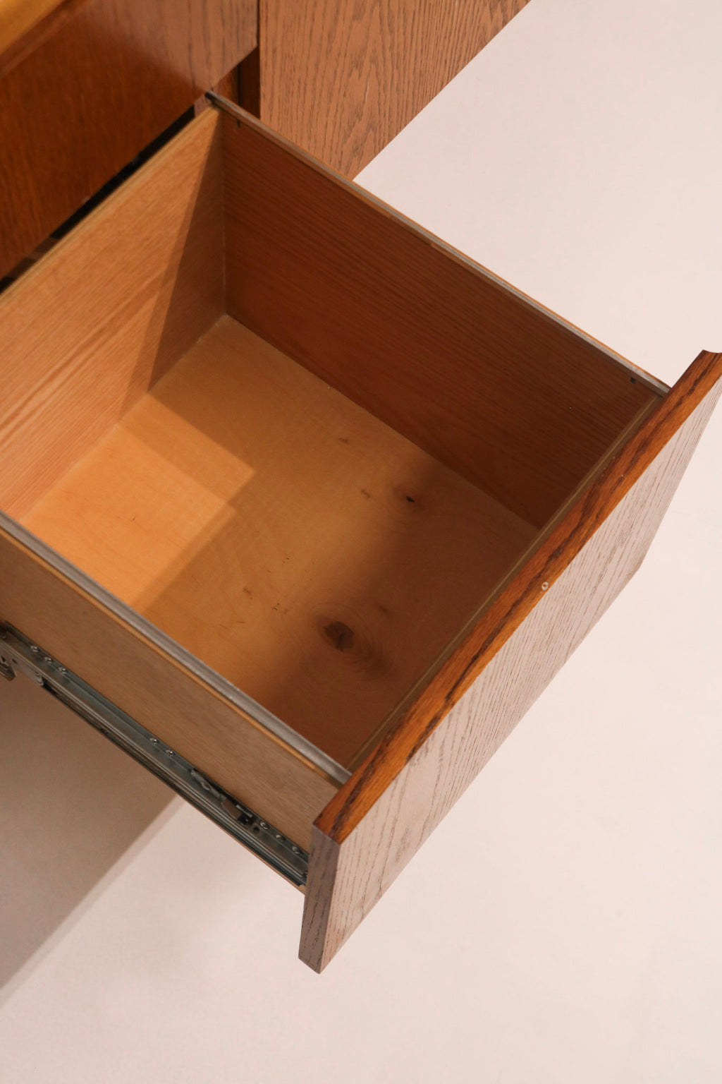 Top-down view into an open drawer showing ample storage space