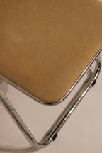 Top-down view of seat cushion shape and chrome frame outline