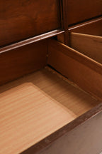 Top drawers open revealing storage capacity and wood interior