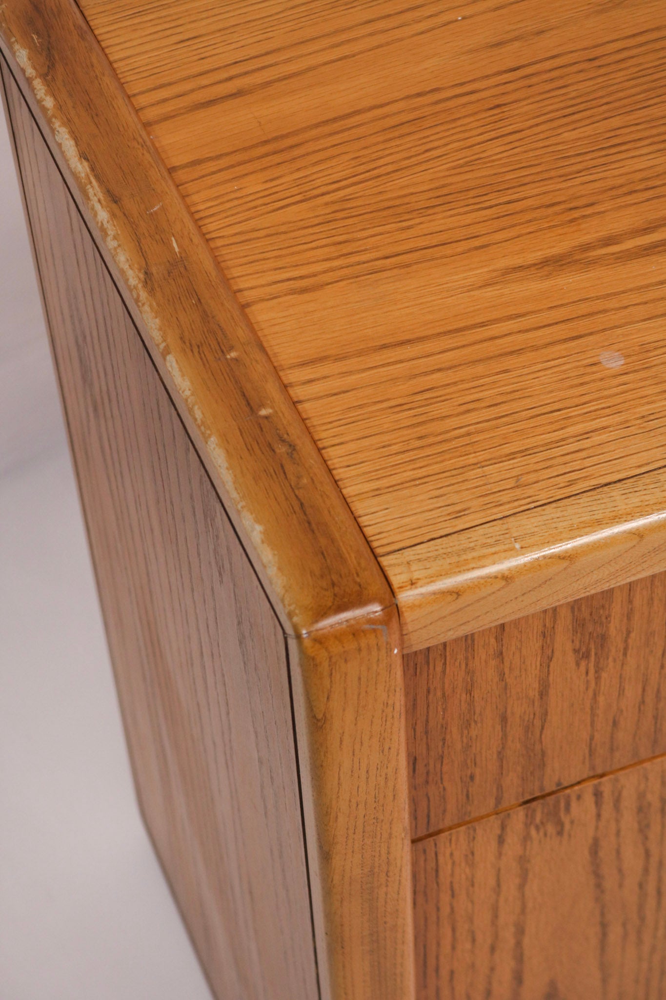 Close-up of the top edge wood grain and finish condition