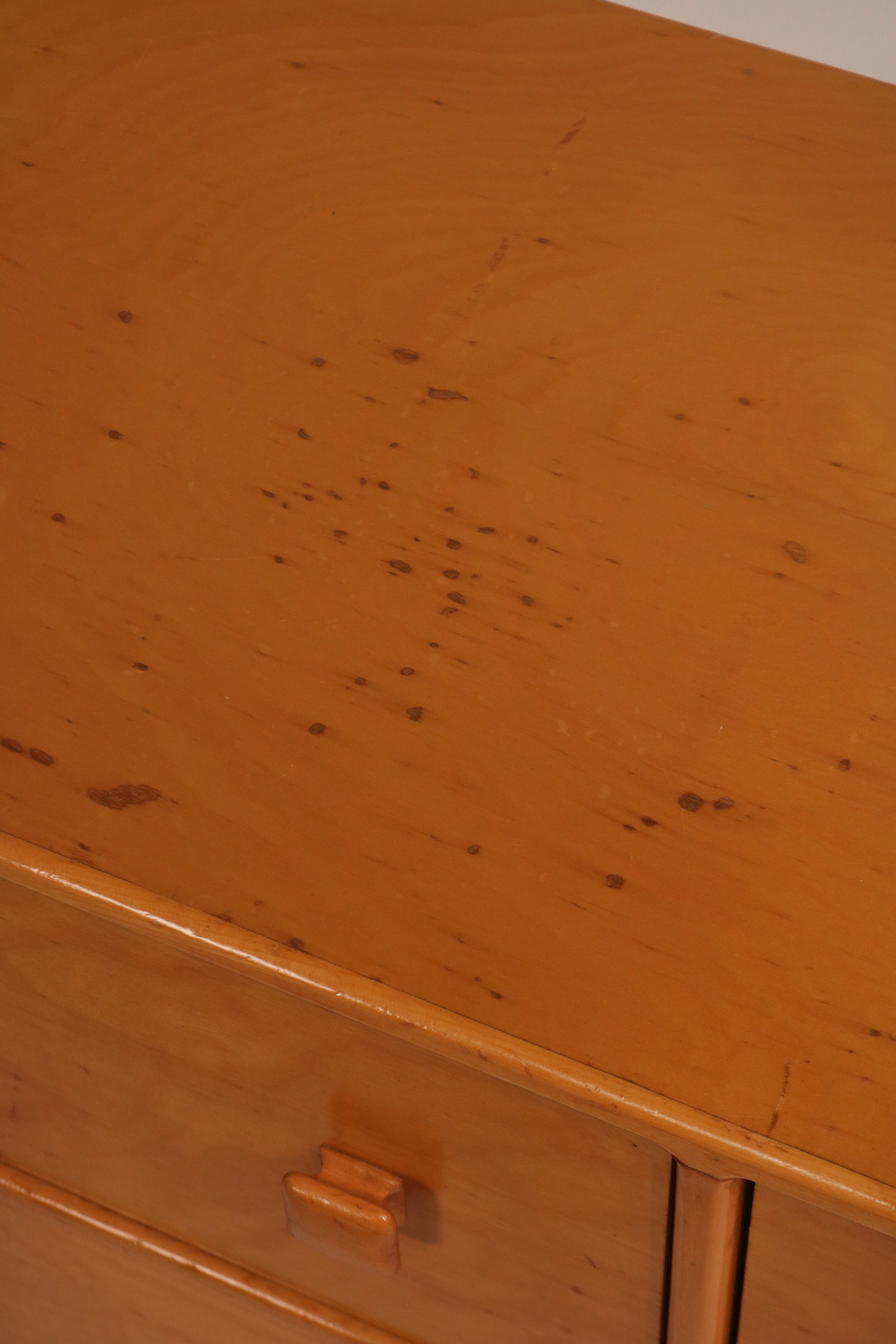 Close-up detail showing cosmetic marks and wear on the top surface