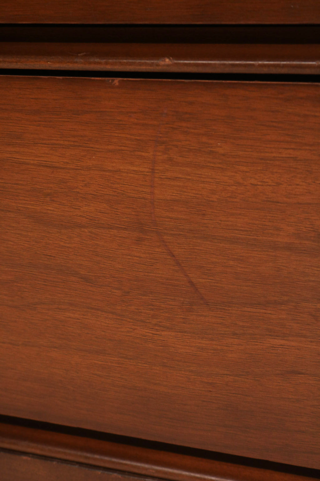 View of top surface walnut finish condition and area with missing part