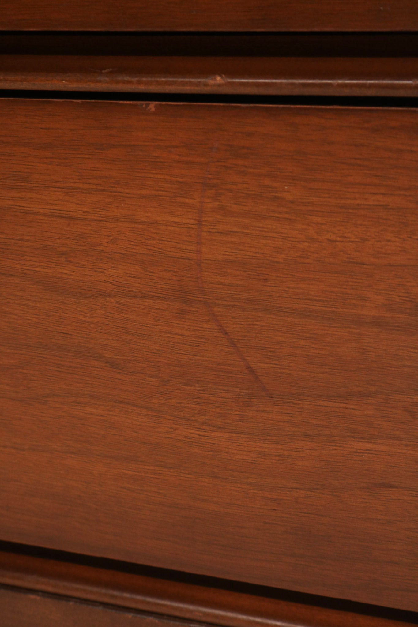 View of top surface walnut finish condition and area with missing part