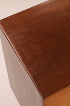Detail of the top surface showing walnut finish and minor vintage wear