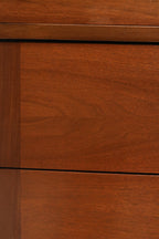 Close-up of top surface showing walnut wood grain and light marks mentioned