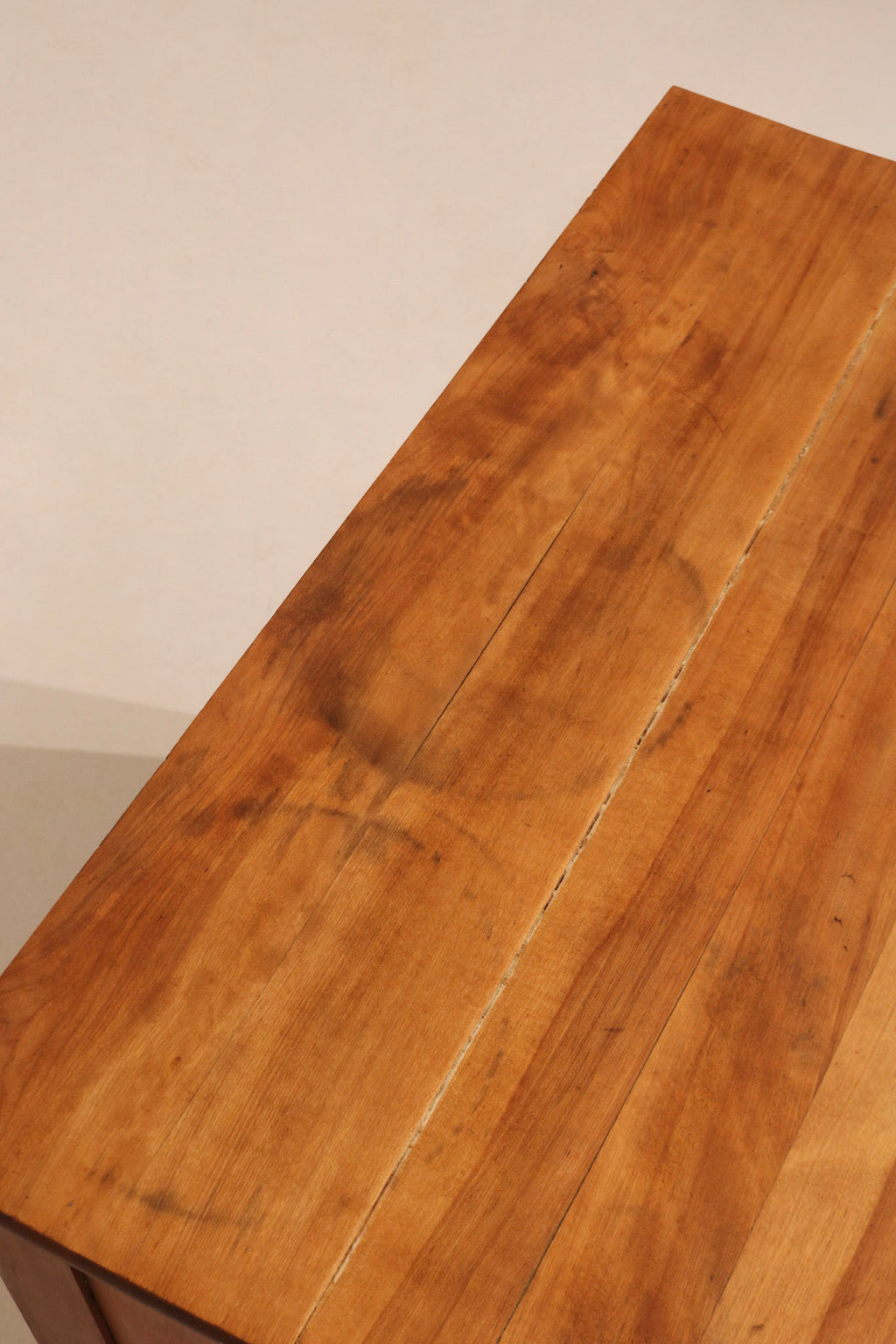 Detail of top surface showing beautiful wood grain and historical wear marks