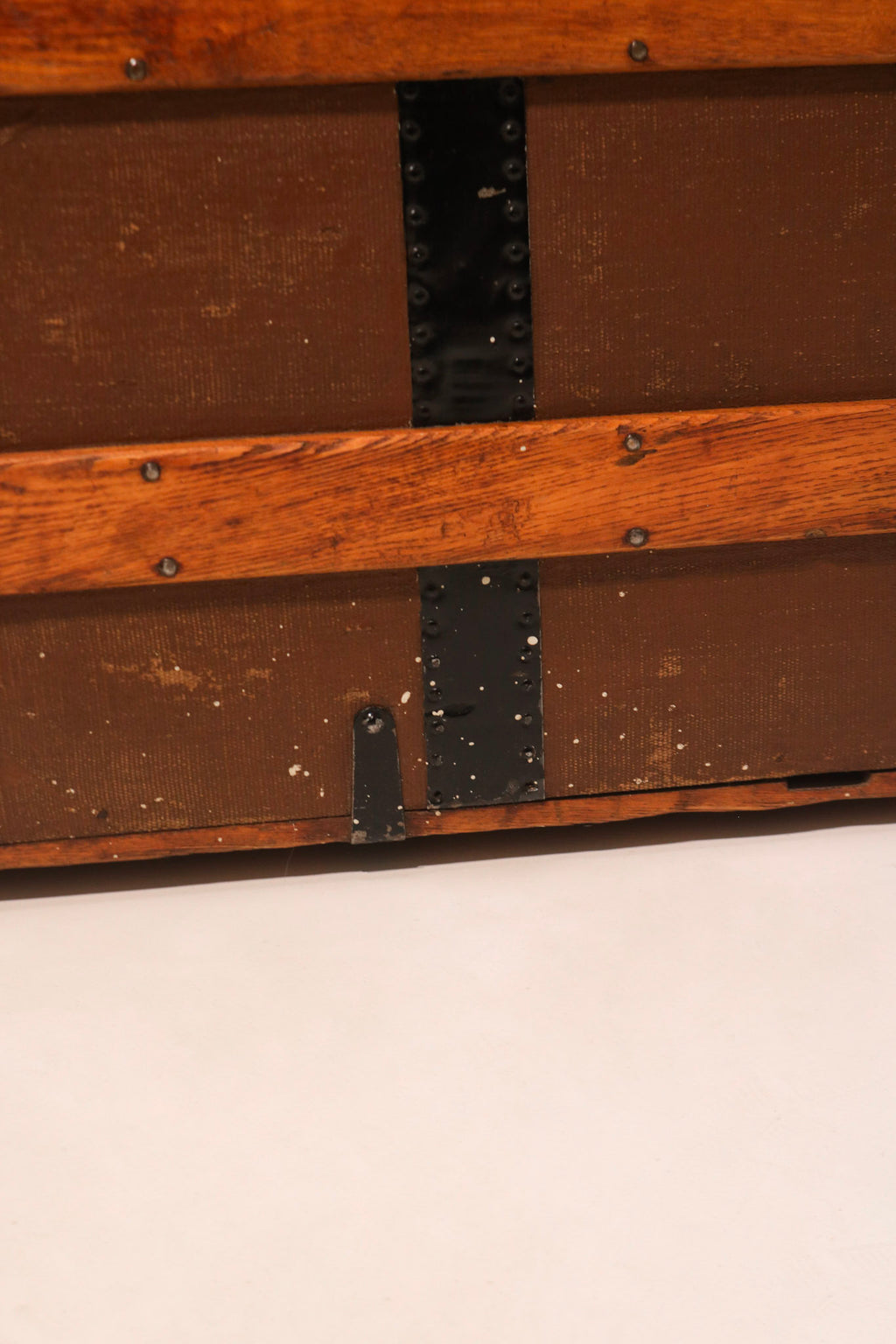 Back panel detail showing pine wood planks and iron reinforcement bands
