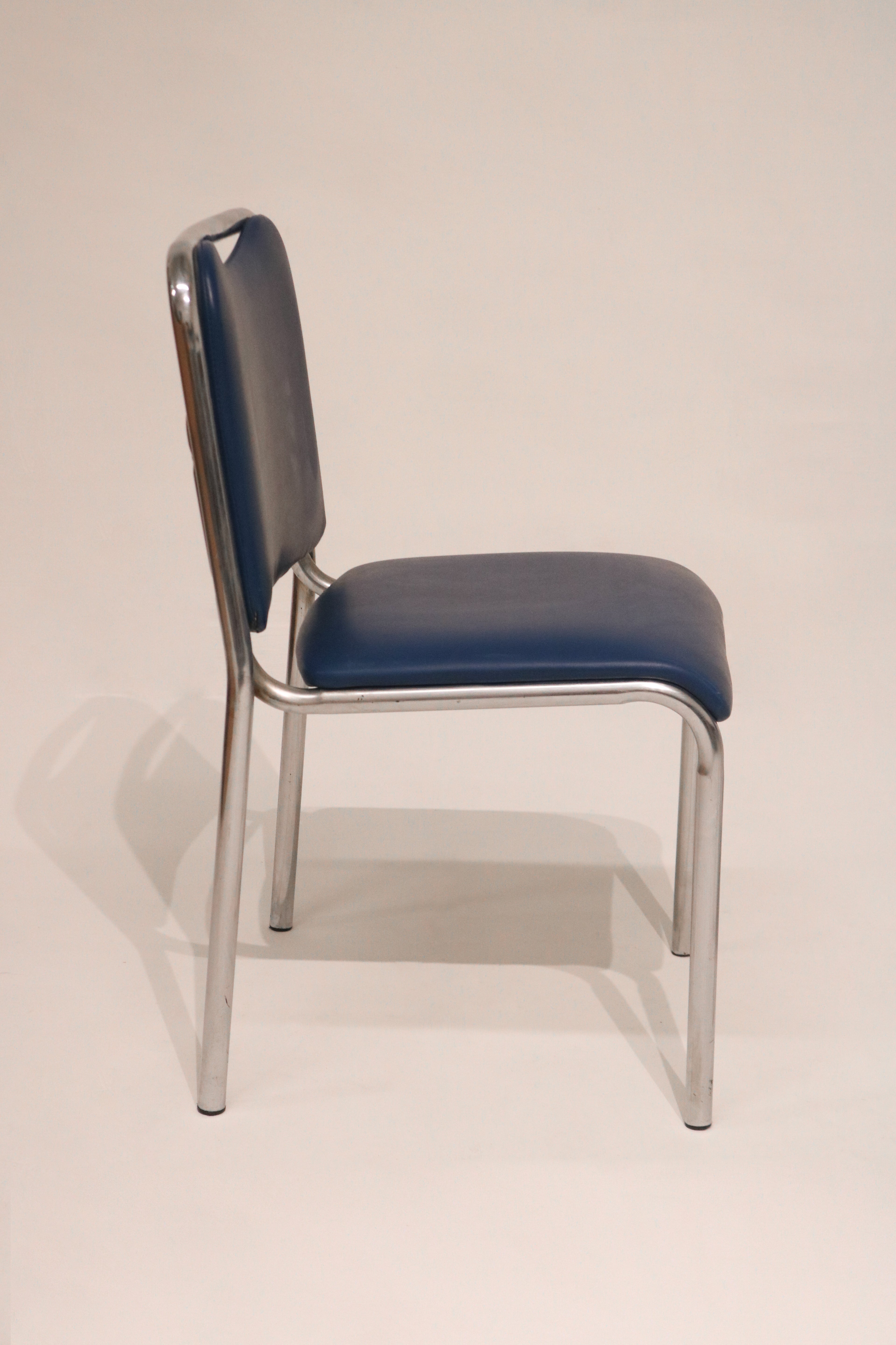 Detail of the smooth curve on the tubular steel backrest frame