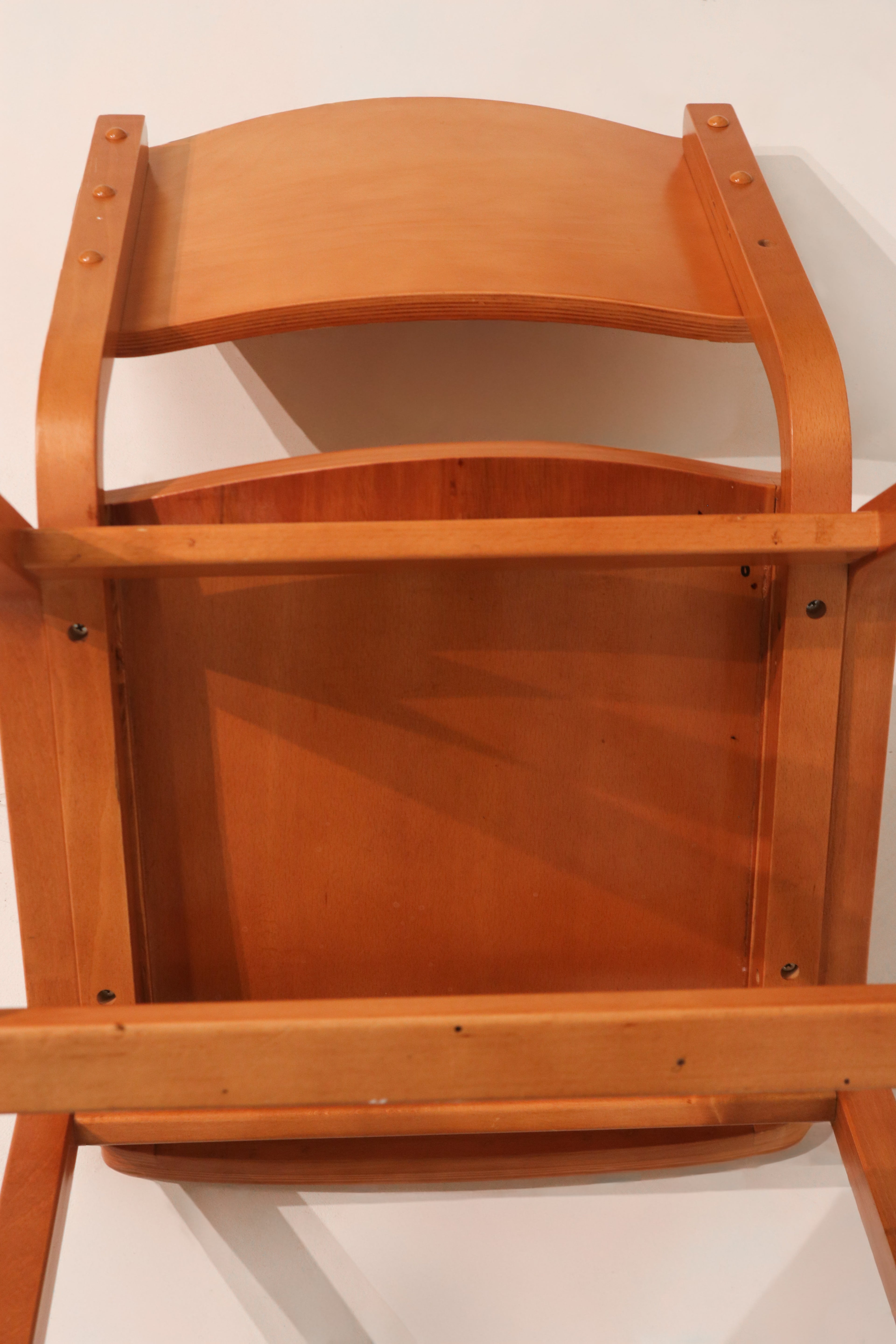 Underside view of chair frame construction and reinforcement