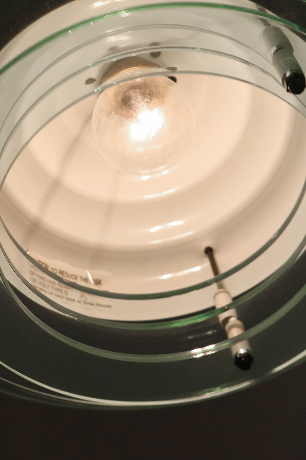 Underside view looking up into the shade and lightbulb socket