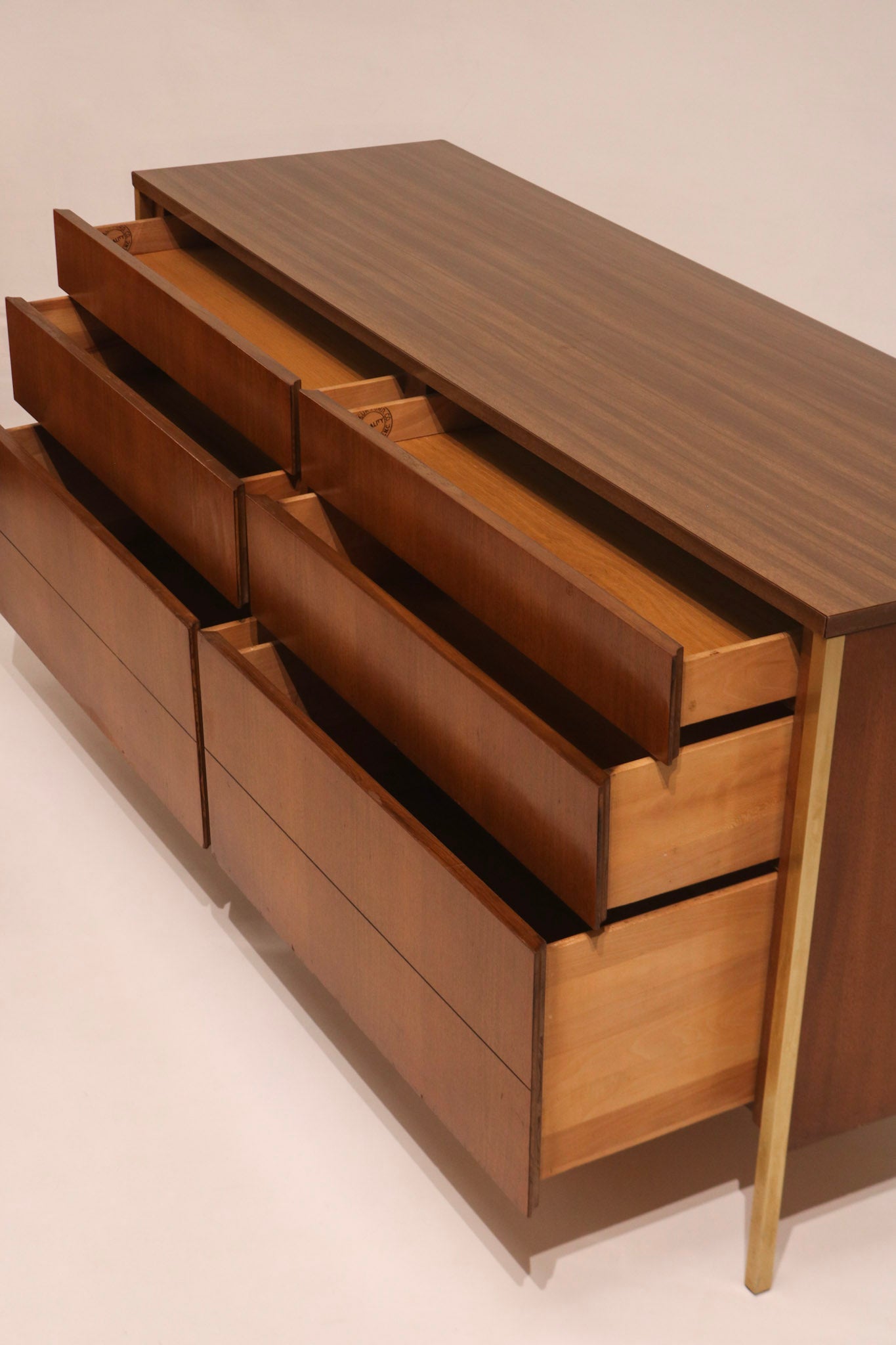 View of upper drawers open revealing storage capacity and construction
