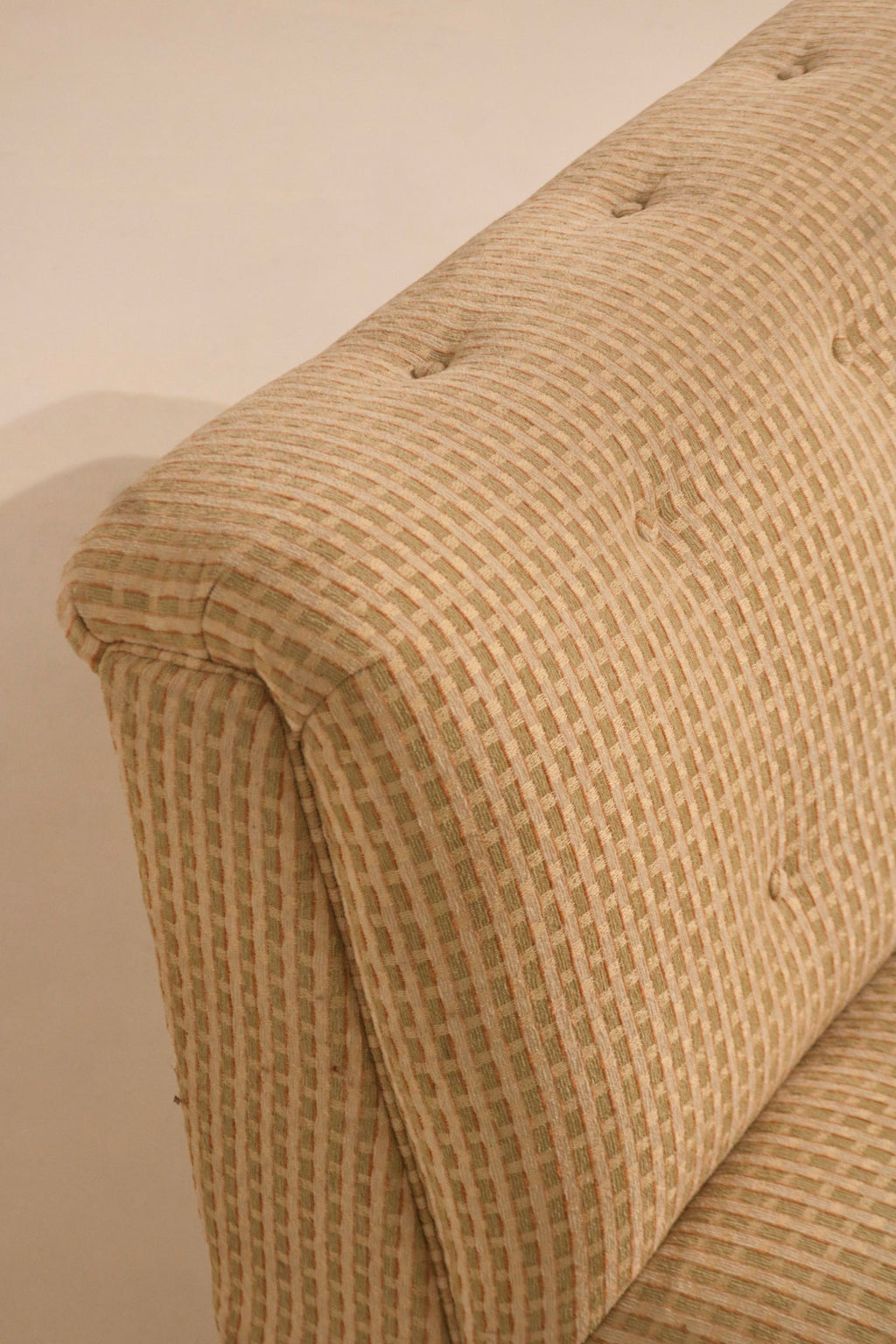 Upper side armless design detail showing fabric condition and stitching