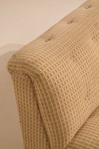 Upper side armless design detail showing fabric condition and stitching