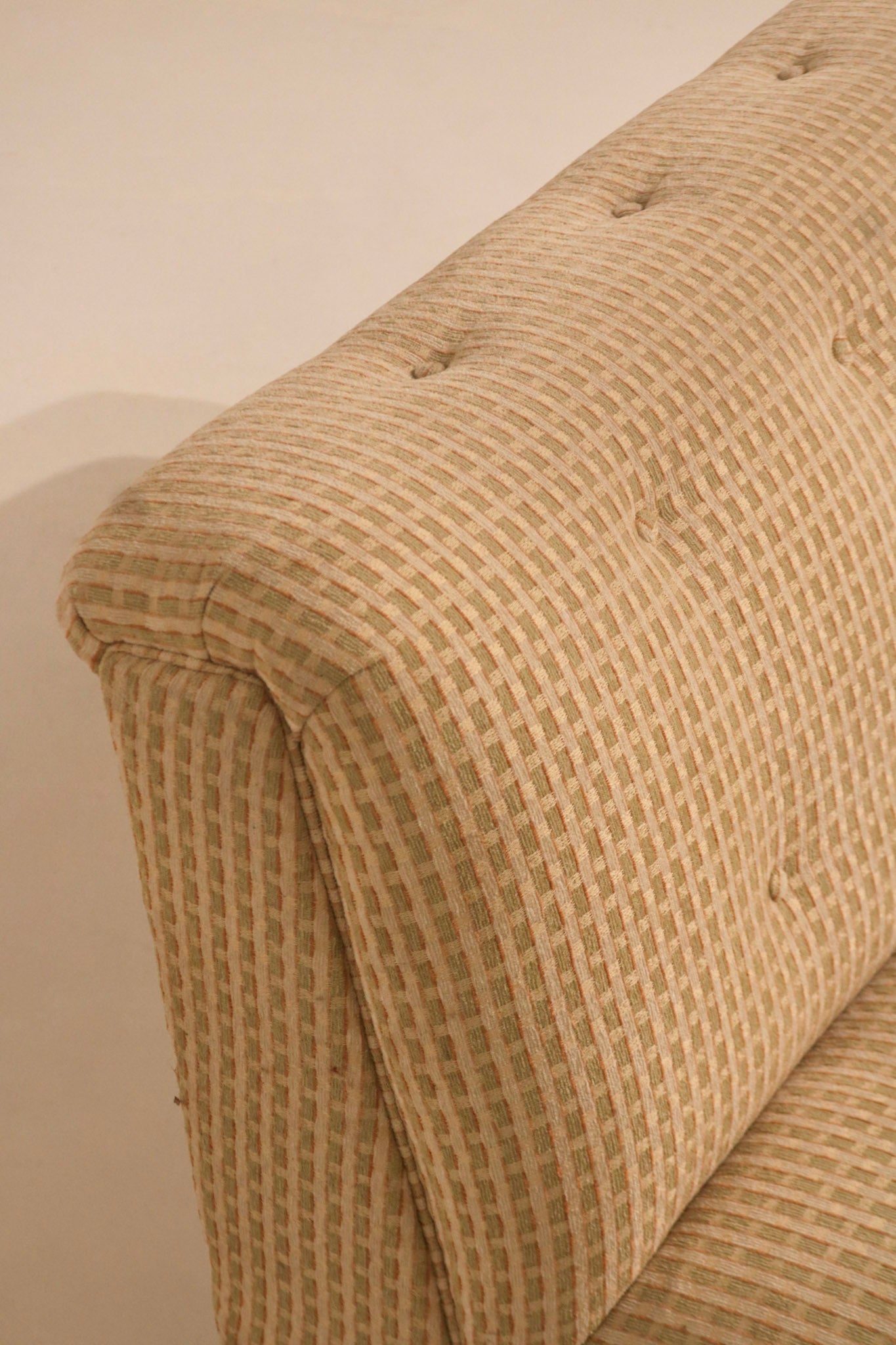 Upper side armless design detail showing fabric condition and stitching