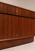 Close-up of vertical groove design detail on cabinet doors