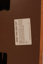 View of vintage label or sticker on the underside or back