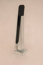 Base and stand detail of vintage postmodern full length mirror with minor wear