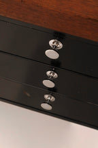 Detail of water marks and wear on the solid walnut top surface