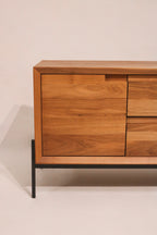 Close-up of the solid walnut wood grain on the front door panel