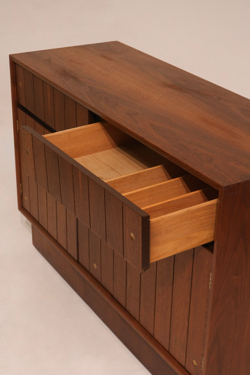 Close-up of walnut wood grain pattern on the top surface